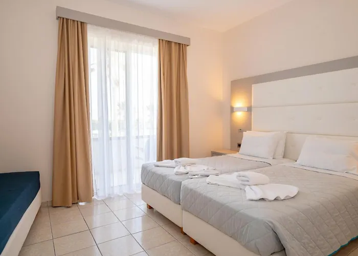 Costa Angela Seaside Отель