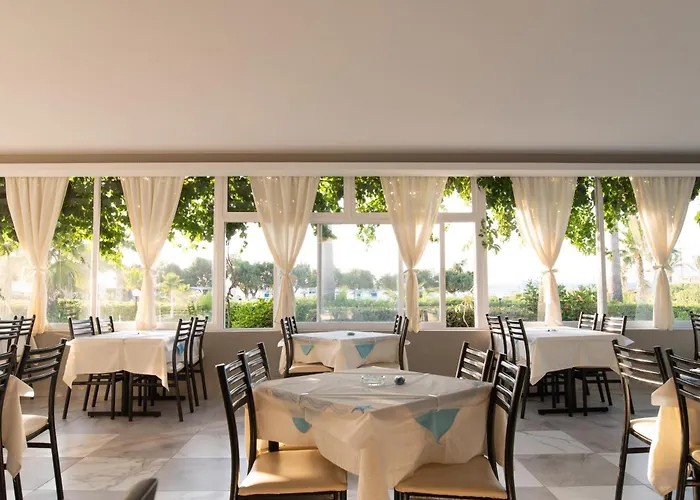 Costa Angela Seaside Отель