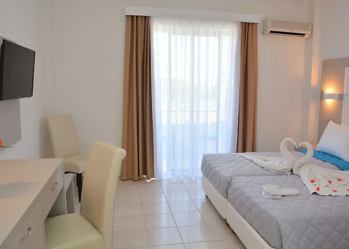 Costa Angela Seaside Отель